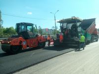 На улице Ковенской уложен первый слой нового покрытия автодороги